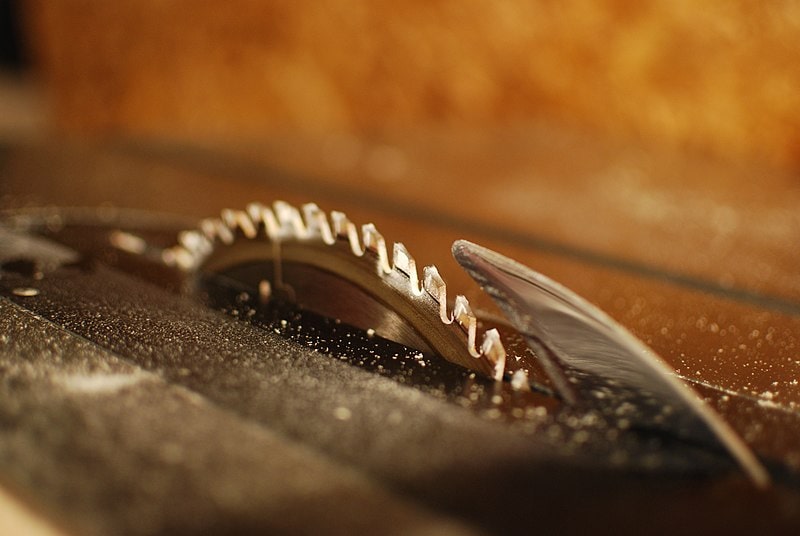 A close-up shot of a table saw blade How To Change a Table Saw Blade featured photo